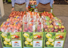 The New York Apple Association Harrison Brown, Nathaniel Foster proudly display the apple their members produce and pack.